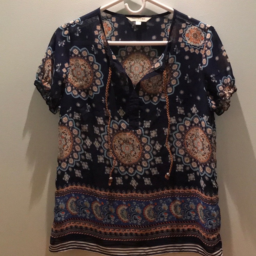 Tantrums size small short sleeve peasant top with leather ties.
